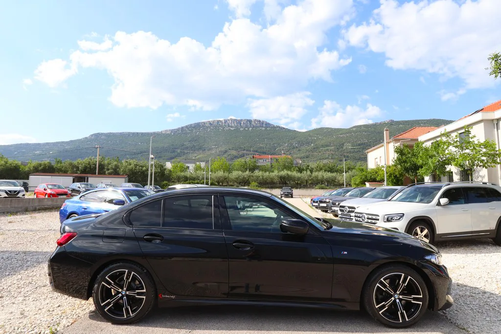BMW Serija 3 2024: fotografija 2